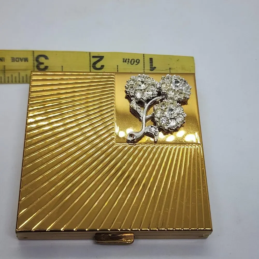 Vintage Volupte Rhinestone Flower Powder Compact Gold Tone Sunburst Mirror